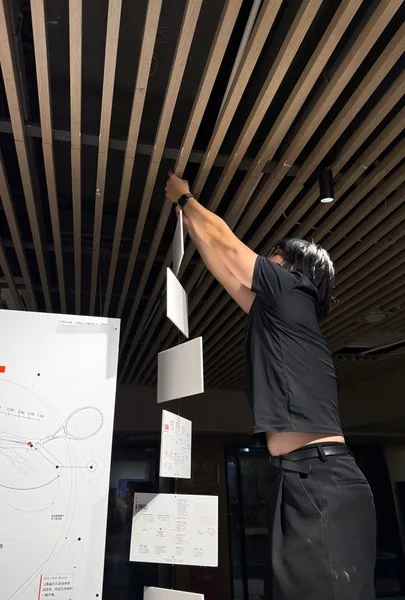 Me hanging the mobile of cards