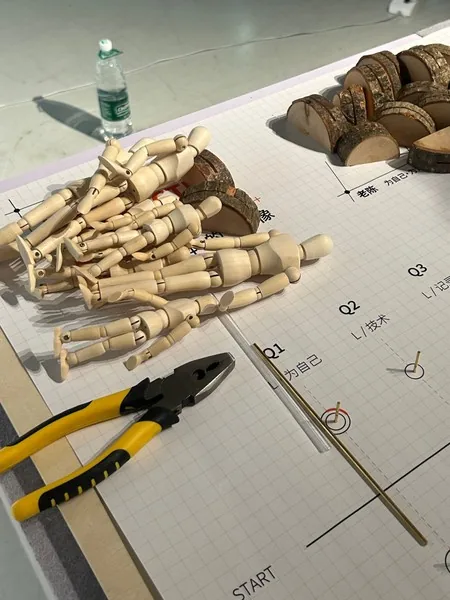 The parts: wooden figures, wood rounds, the printed path